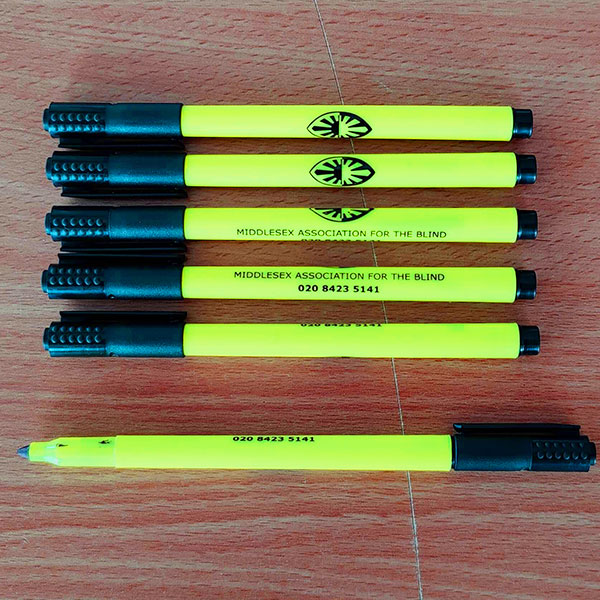 Black marker pens in a bright yellow casing